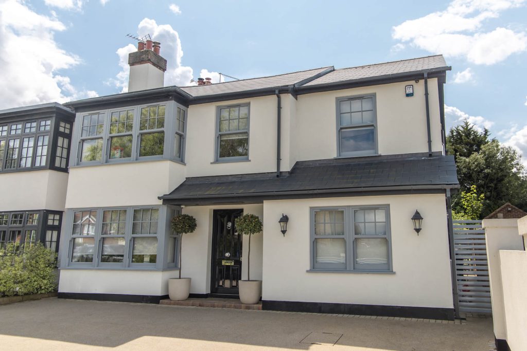 Grey sliding sash installation on modern home